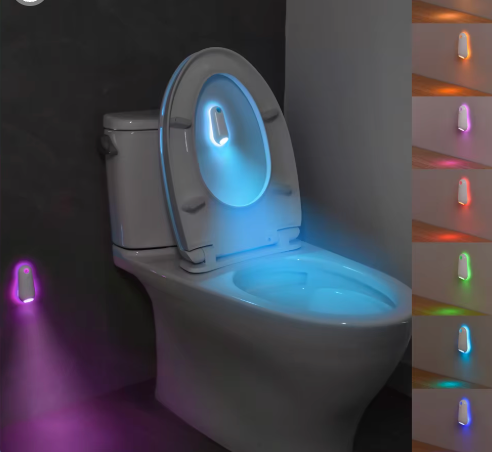 Glow Bowl motion-sensor toilet night light glowing in different colors